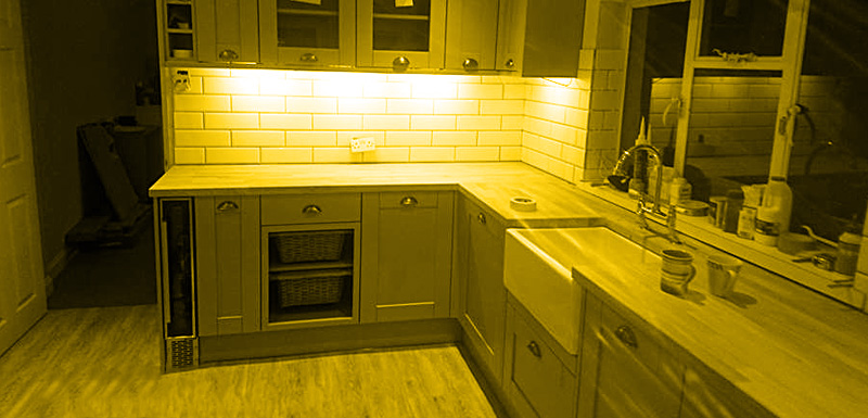 Kitchen installation with yellow fade